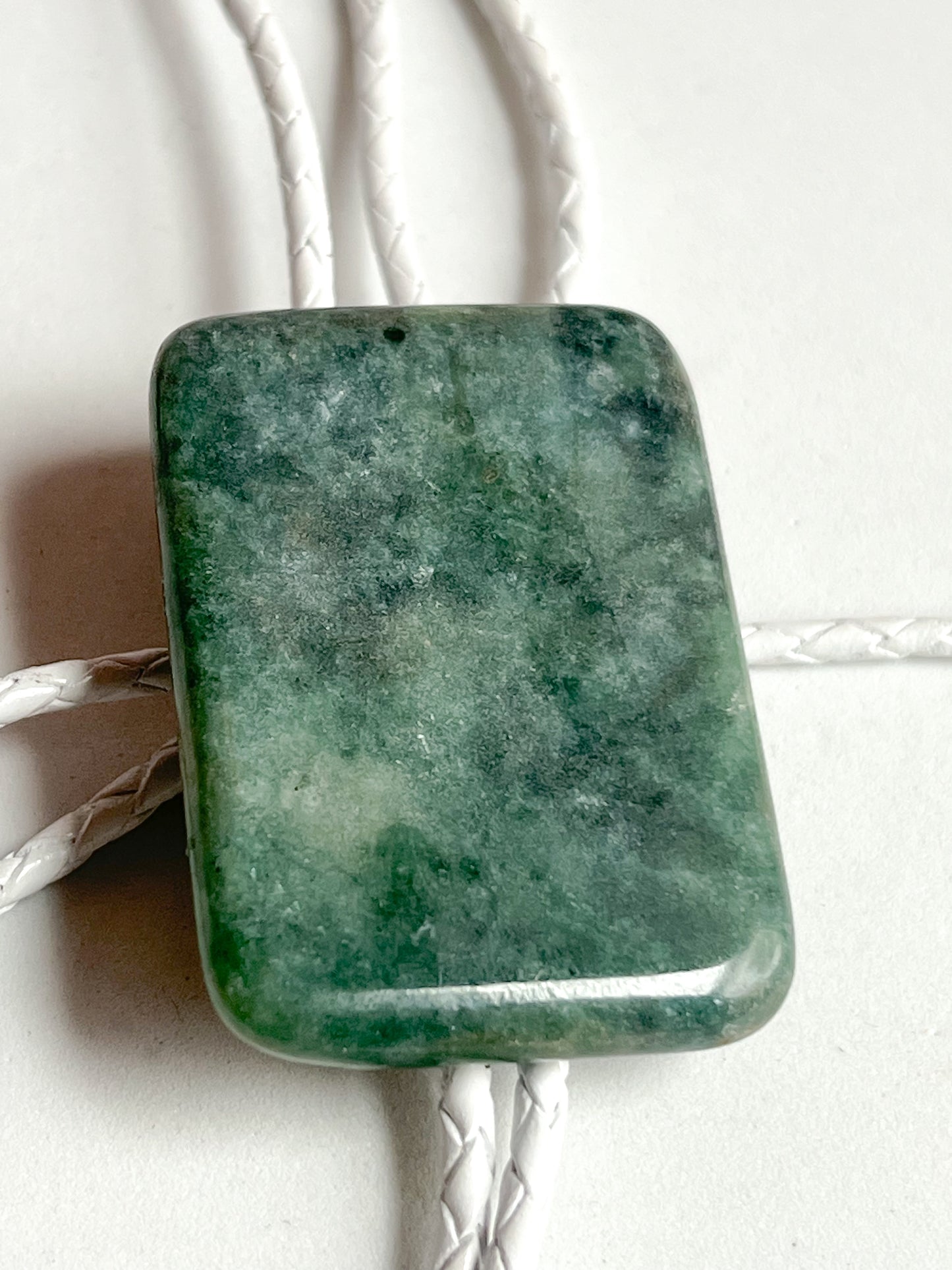 Jade Bolo Tie With White Leather Cord and Silver Tone Tips