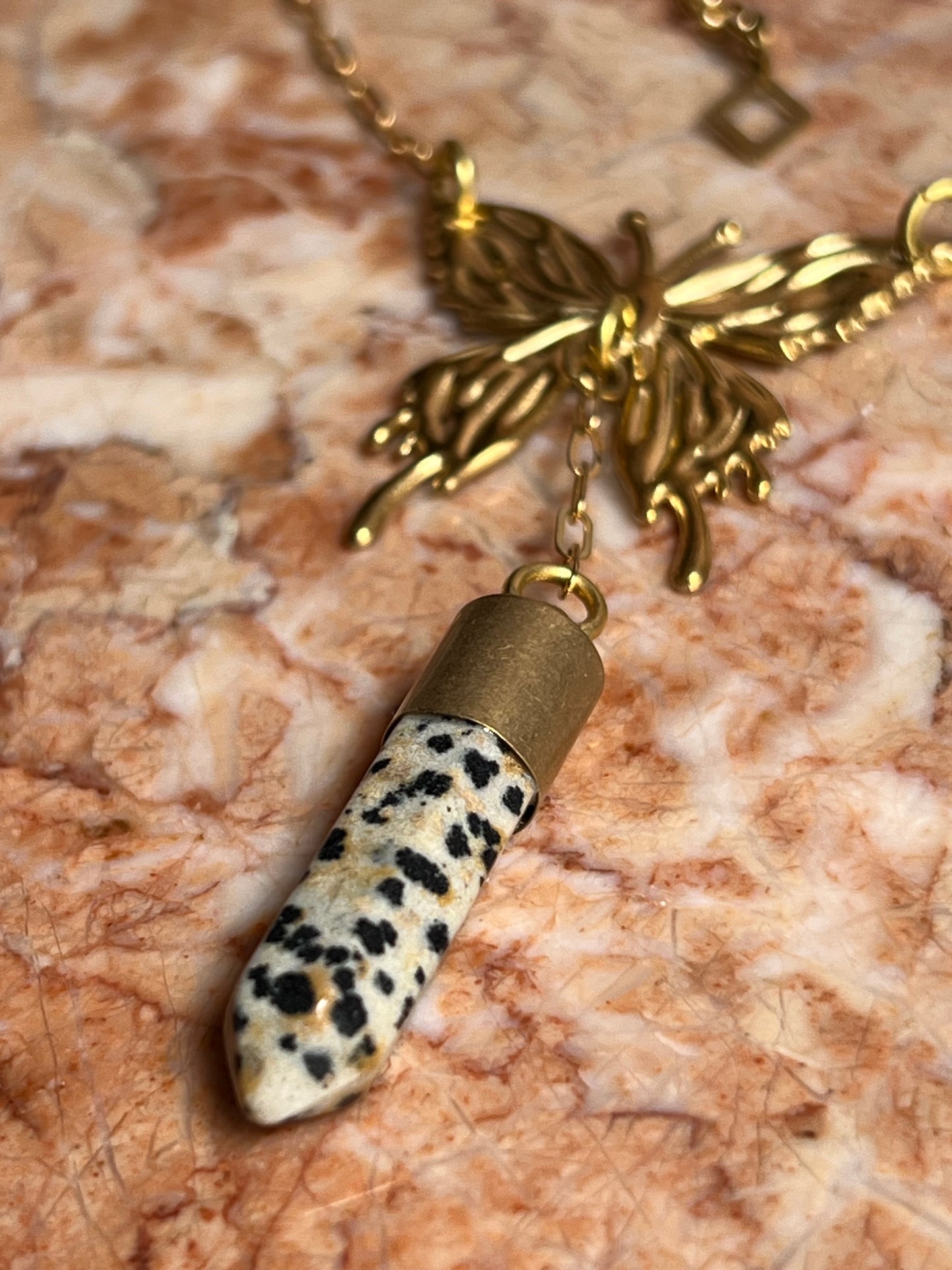 Brass Abstract Butterfly Necklace with Dalmatian Jasper Point