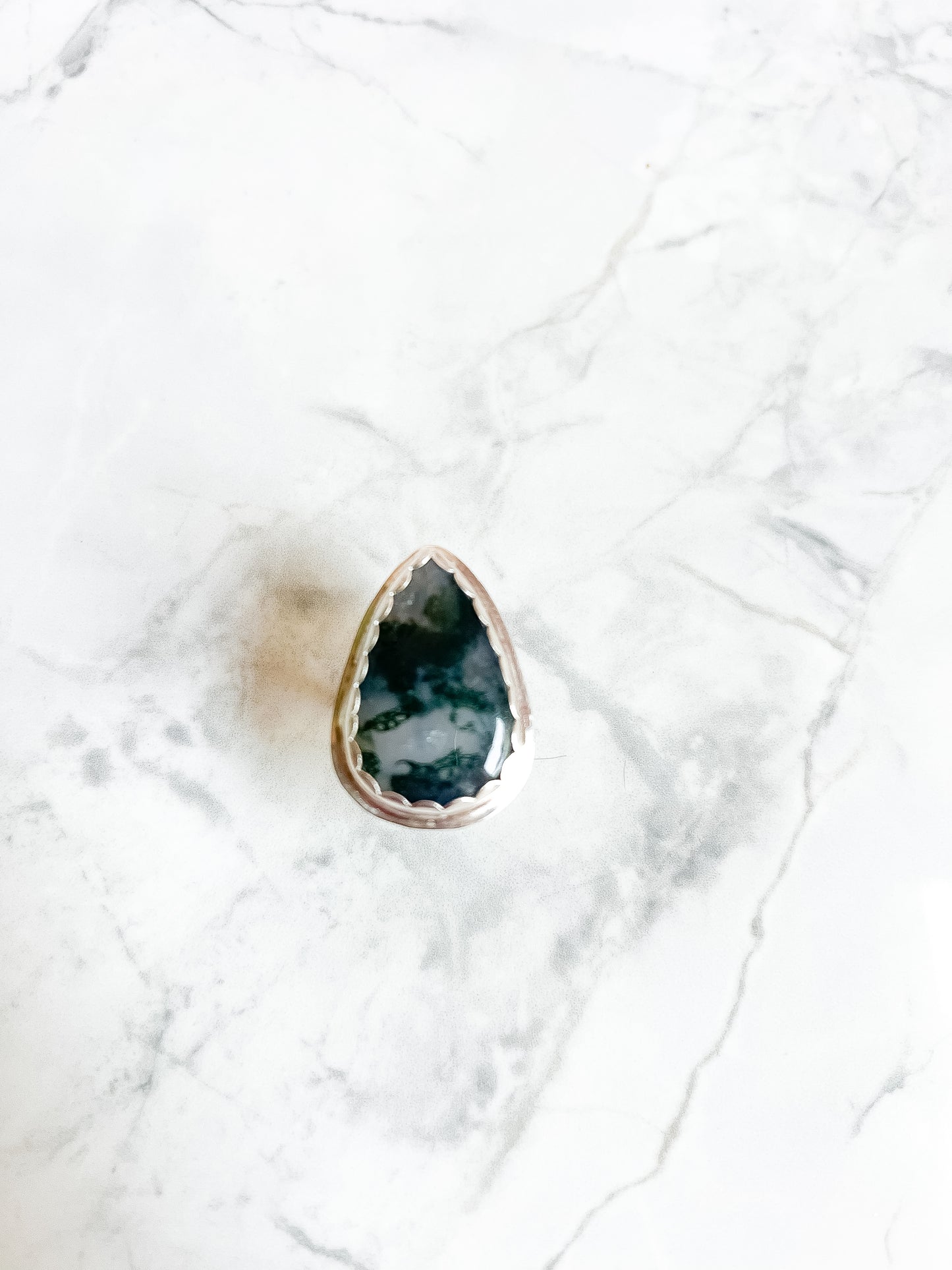 Sterling Silver Ring with scallop set moss agate