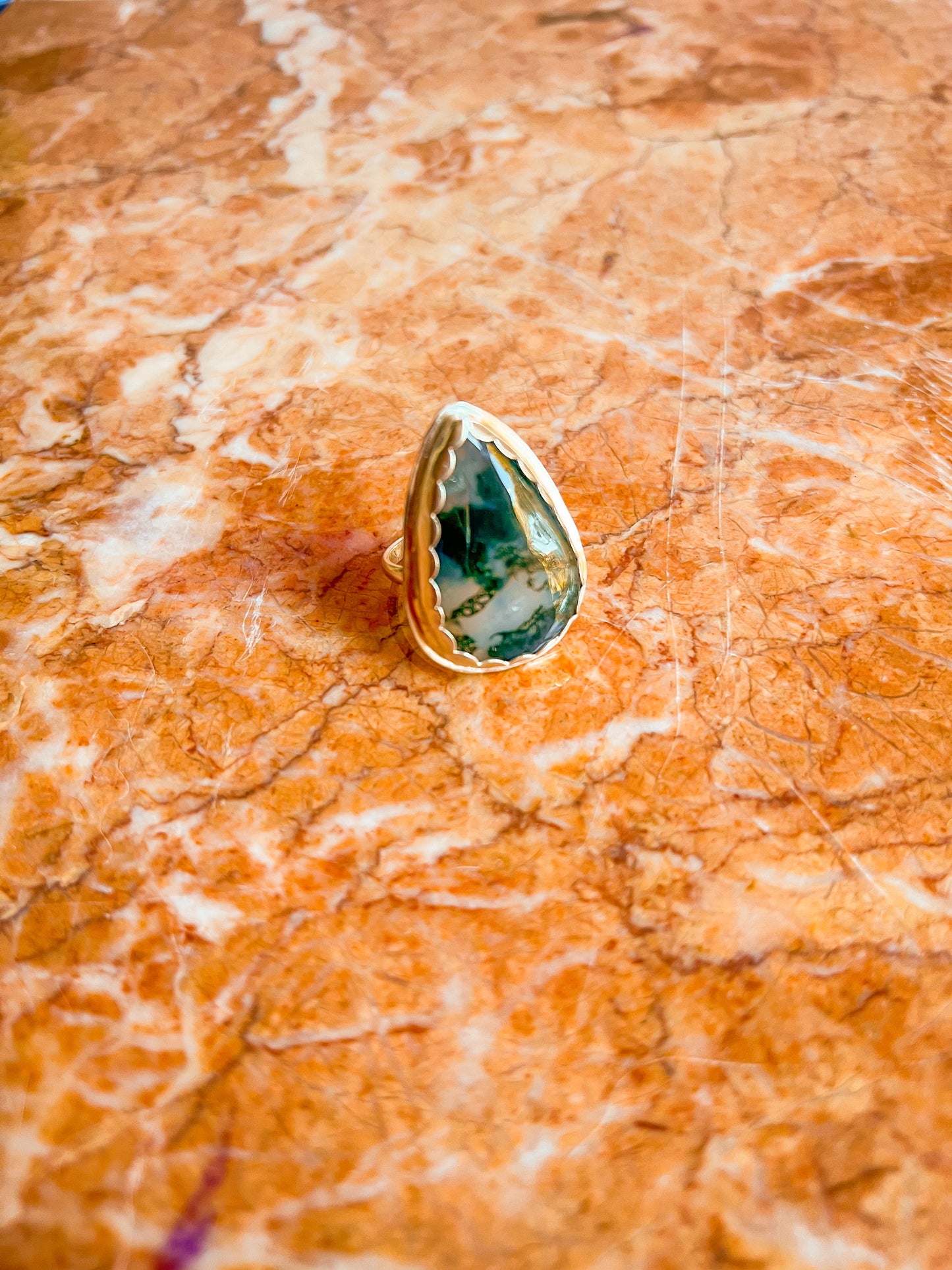 Sterling Silver Ring with scallop set moss agate