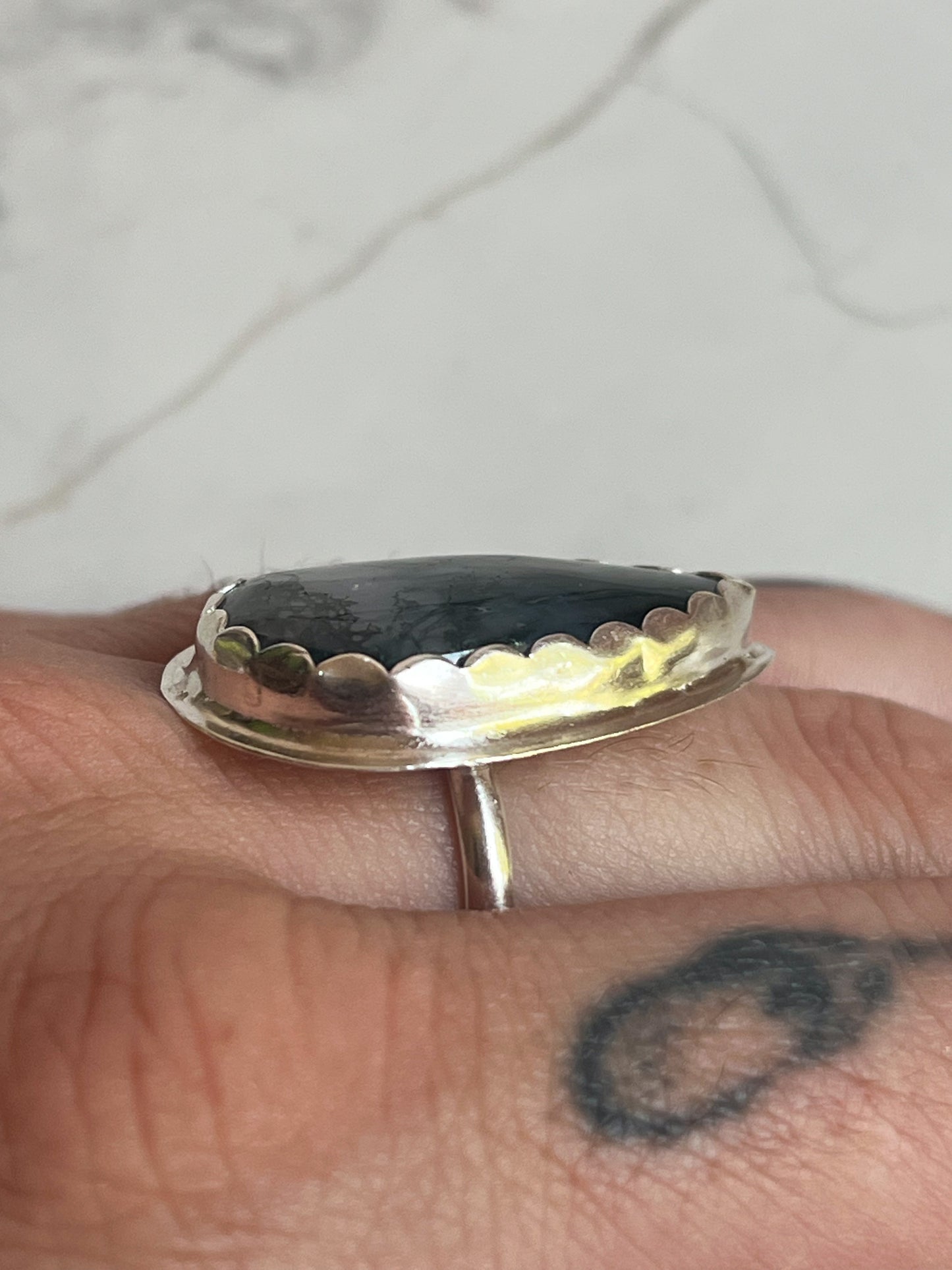 Sterling Silver Ring with scallop set moss agate