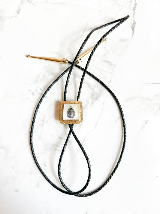 Hammered brass Bolo Tie with abalone tear inlaid mother of pearl and black Leather Cord